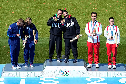 Skeet mixed team: Silver medalists Vincent Hancock, Austen Jewell Smith of the United States, gold medalists Italy's Gabriele Rossetti and Diana Bacosi, center, and bronze medalists China's Lyu Jianlin and Jiang Yiting